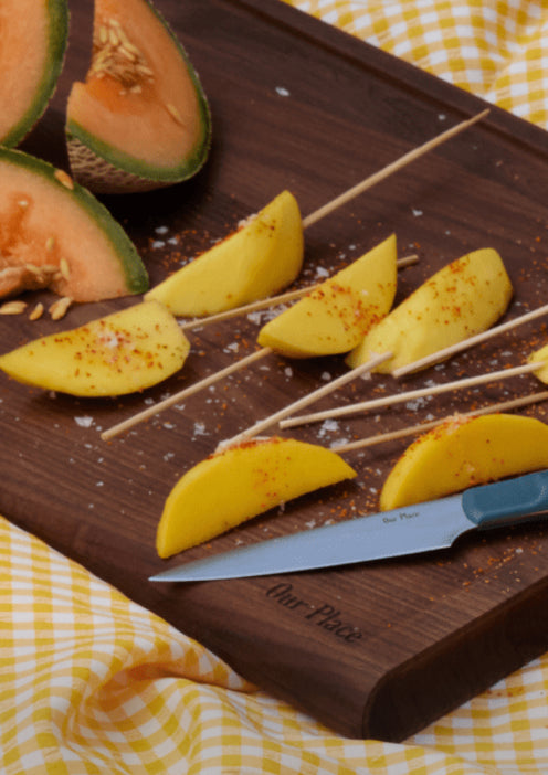 paring knife on cutting board