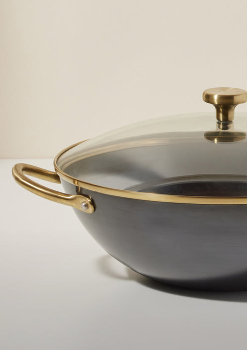 black hot work with gold rimmed glass lid