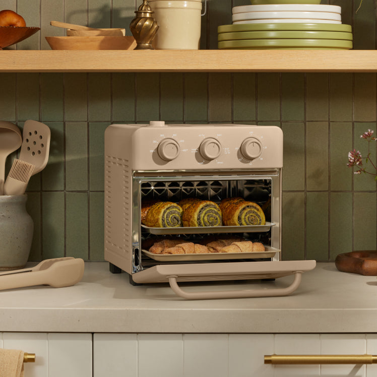 Beige wonder oven on countertop
