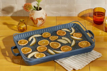 Blue Griddle Pan, Oven Mat, Oven Rack and Fruit slices