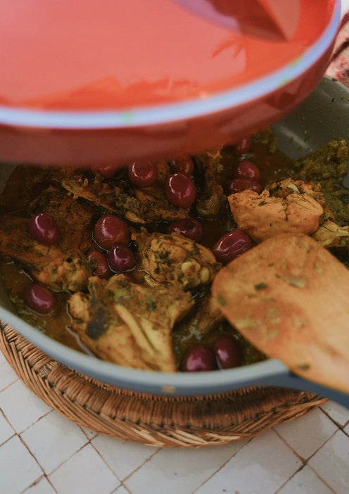 slow cooking a meal with clay & olive tagine