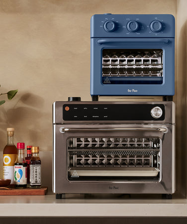 Kitchen scene with a toaster oven and various food items on a counter.
