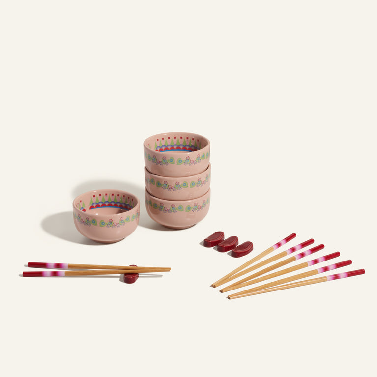 pink rice bowl set with chopsticks