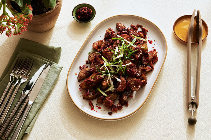 Roasted Japanese Sweet Potatoes with Chili Crisp Pecans