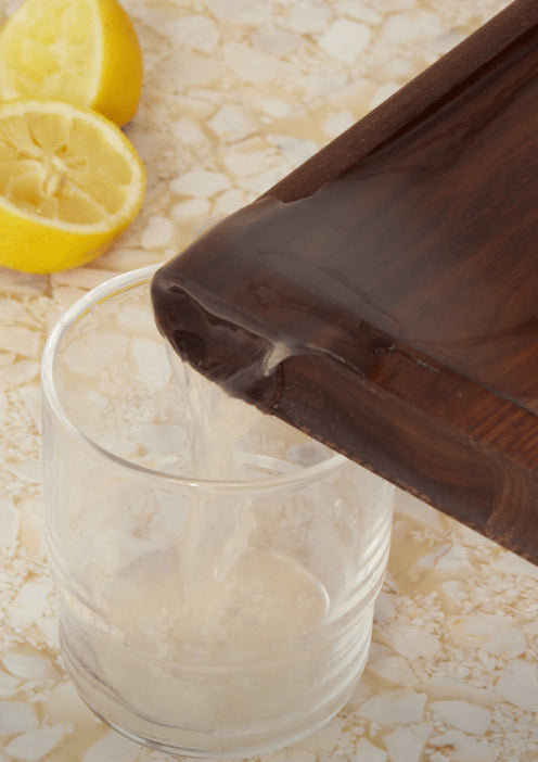 pouring juice from cutting board