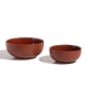 Two round, brown ceramic bowls of different sizes on a white background.
