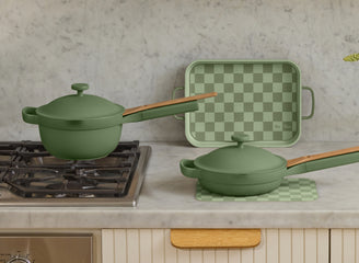 sage mini perfect pot, mini always pan, mini griddle pan and mini oven mats on stove and counter
