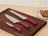 Full prepped bundle, rosa chefs knife, serrated knife, precise pairing knife and walnut cutting board