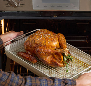 griddle pan and oven rack cooking turkey in oven