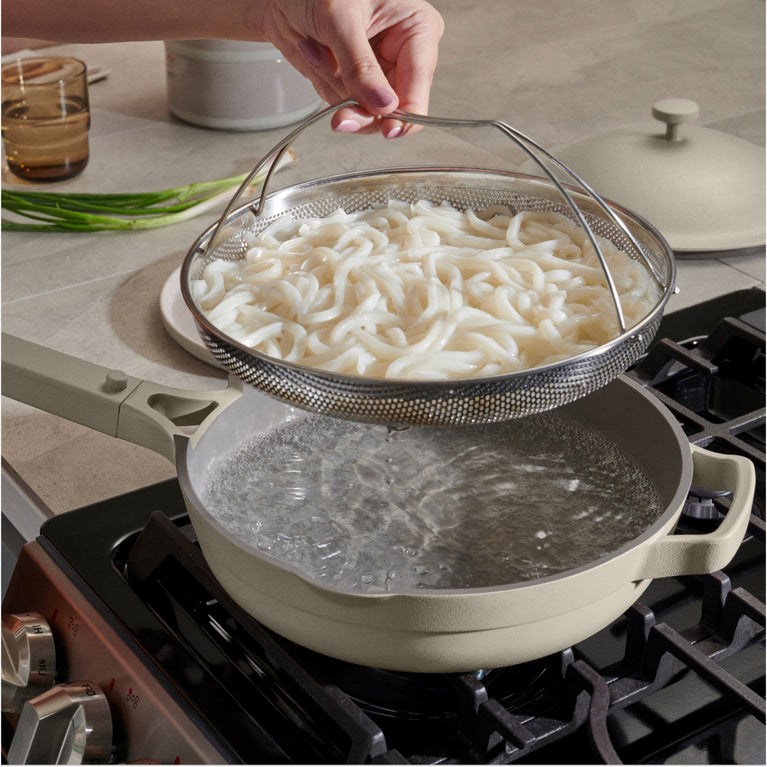  beige-always-pan-on-stovetop-with-noodles