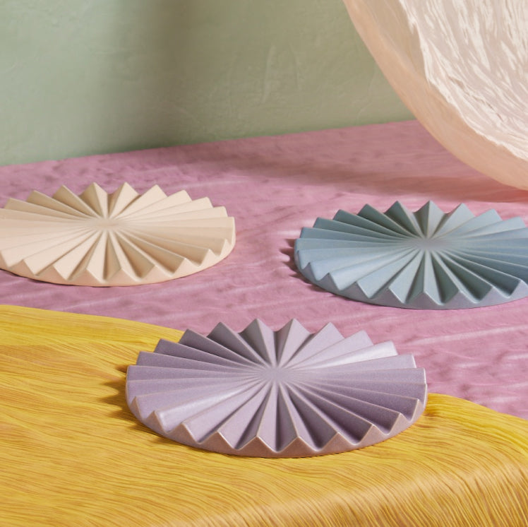 beige, purple, blue pleat trivet