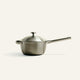 Titanium Perfect Pot Pro 3 L stainless steel saucepan with a matching lid, a long handle, and a short helper handle.