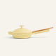 The Ceramic Nonstick Always Pan 20 cm, featuring a yellow finish, matching lid, and light wooden handle, is displayed against a plain neutral background.