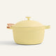 The Ceramic Nonstick Perfect Pot 6 L, featuring a yellow lid and handles on each side, is shown against a plain light background—this versatile 8-in-1 pot is perfect for various cooking needs.