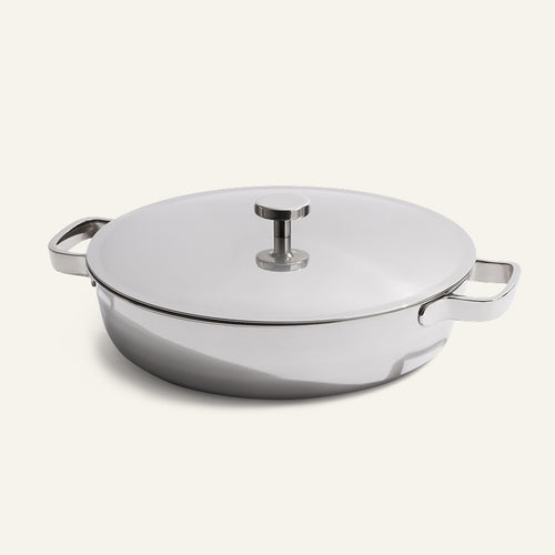 The Titanium Braiser Pro 28 cm, featuring a matching lid and two side handles, is displayed on a plain light background.