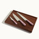 full prepped bundle full of chefs knife, serrated knife, precise pairing knife and walnut cutting board