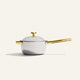 Titanium Perfect Pot Pro 3 L white pot with a lid, a long handle, and a side handle, all featuring gold-colored accents.