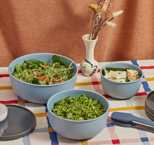 blue salt better bowl set with food on table