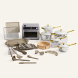 Collection of kitchen cookware and utensils on a white background