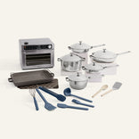 Kitchen appliance set with pots, pans, and utensils on a white background