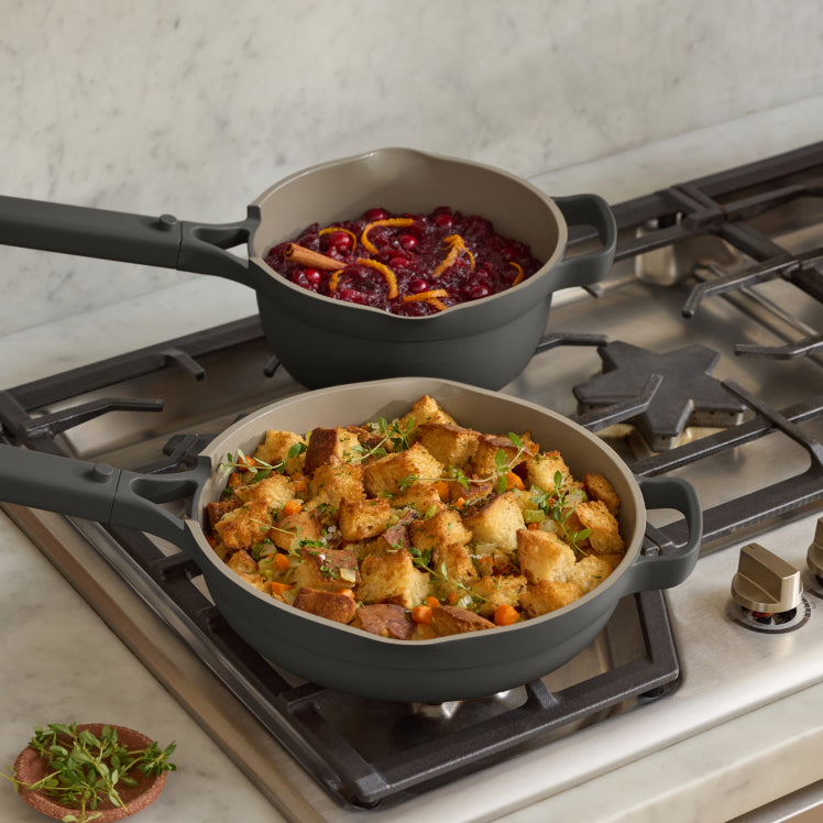 black always pan and black mini perfect pot on stove