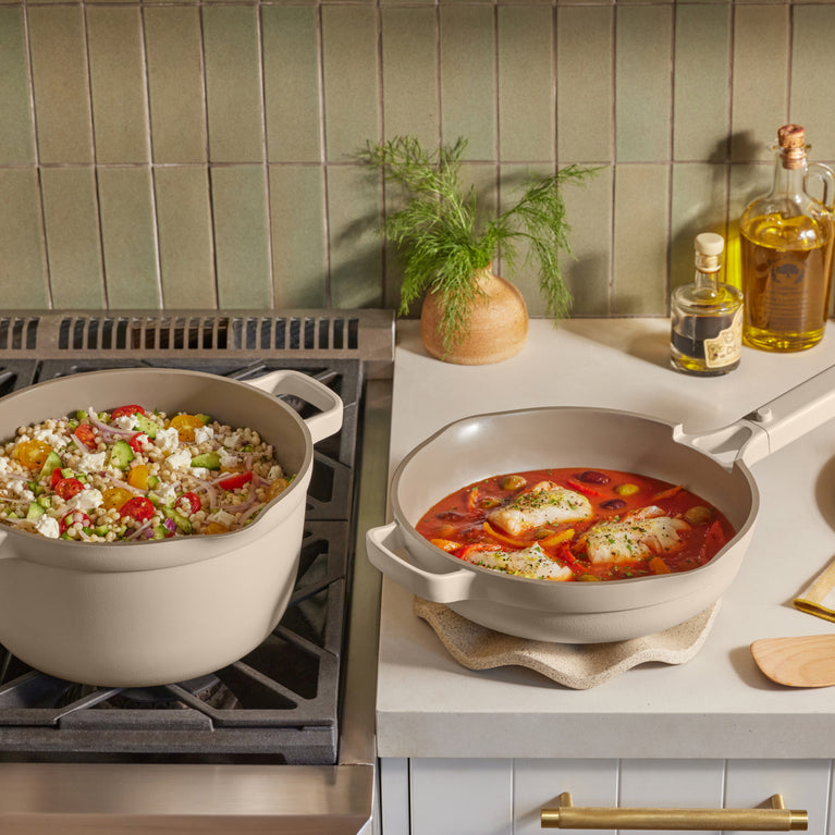 beige perfect pot on stove and beige mini always pan on counter