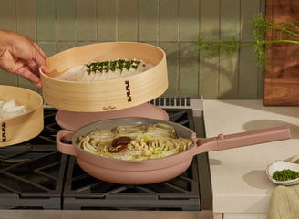 bamboo spruce steamer with pink always pan on stove